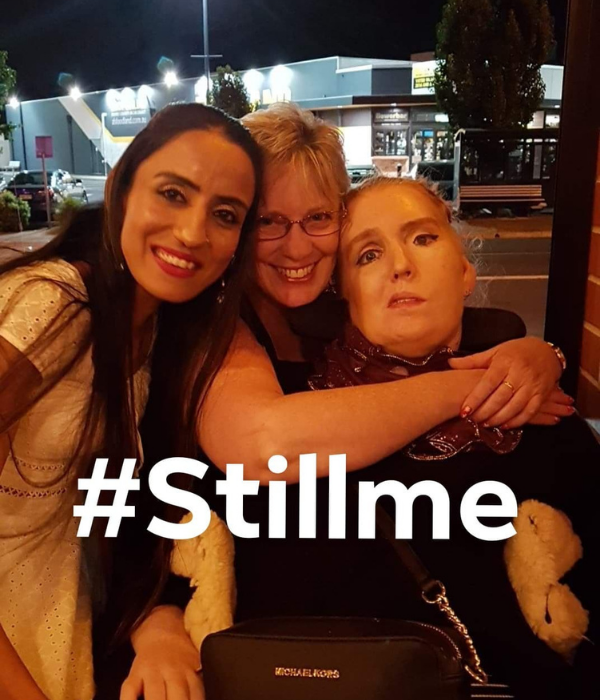 Tracey, her mother, and a friend, with the text "#StillMe". This phrase is often used by people living with locked-in syndrome